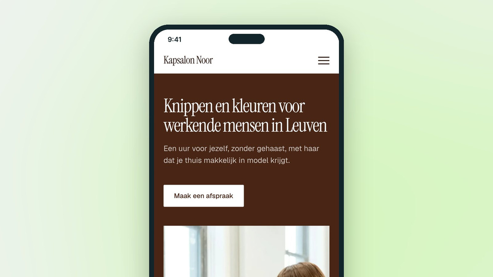 De website van Kapsalon Noor op een gsm.
